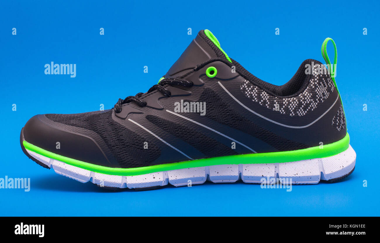 lime green and black sneakers