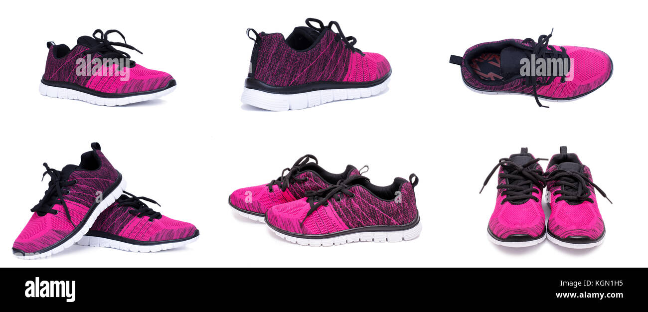 Set of pink and black sport woman shoes isolated on white background Stock Photo