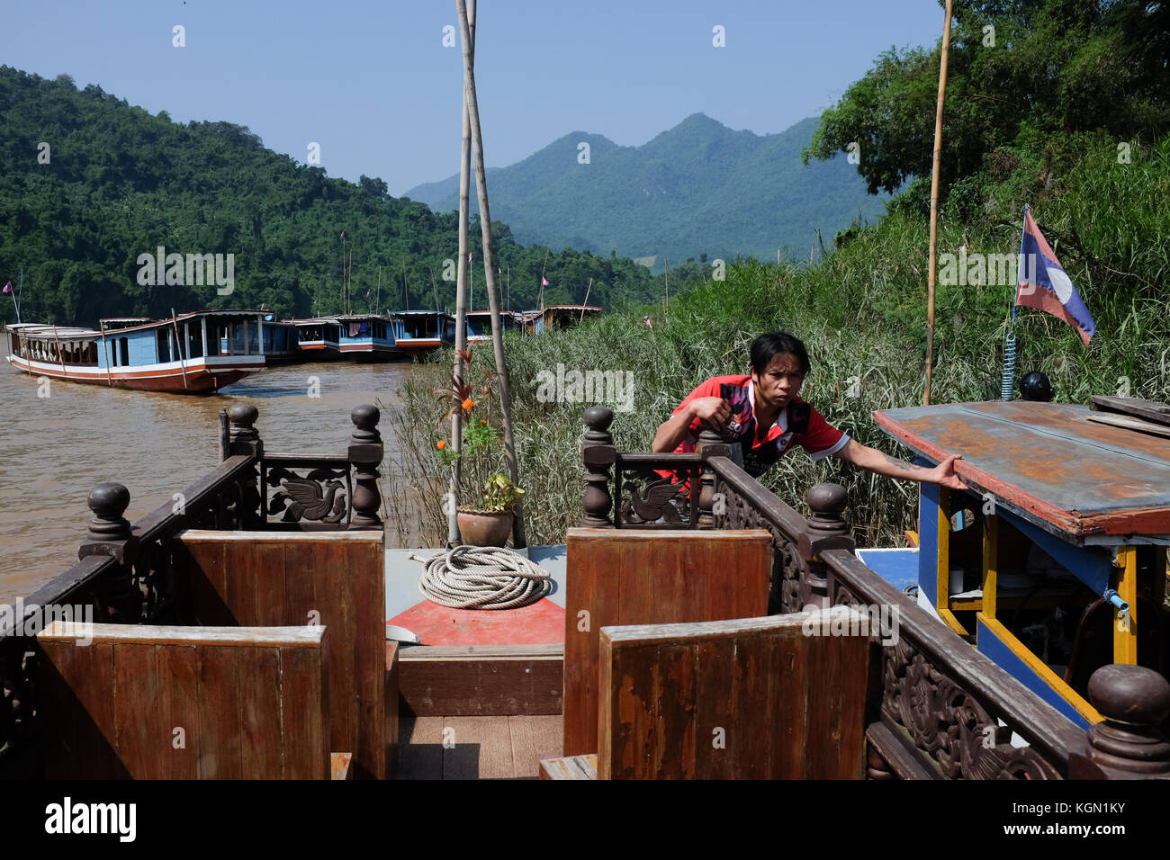 Man pulling a boat hi-res stock photography and images - Alamy