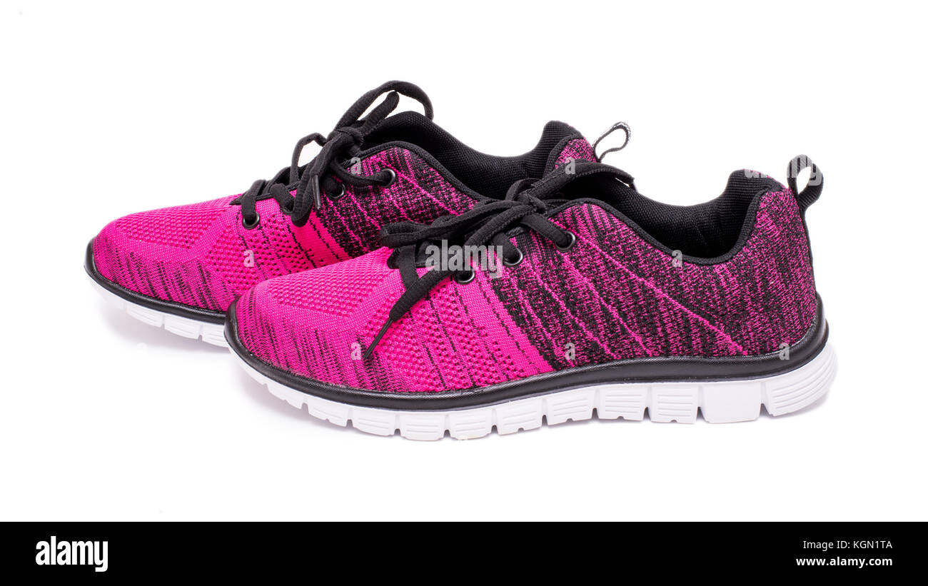 Pair of pink and black sport woman shoes isolated on white background Stock Photo