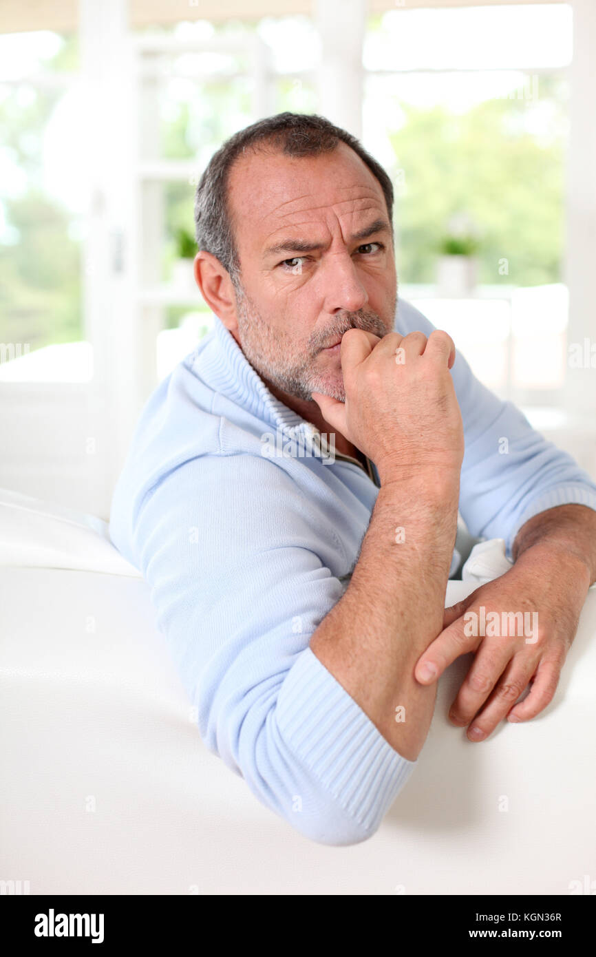 Portrait of senior man with interrogative expression on his face Stock  Photo - Alamy