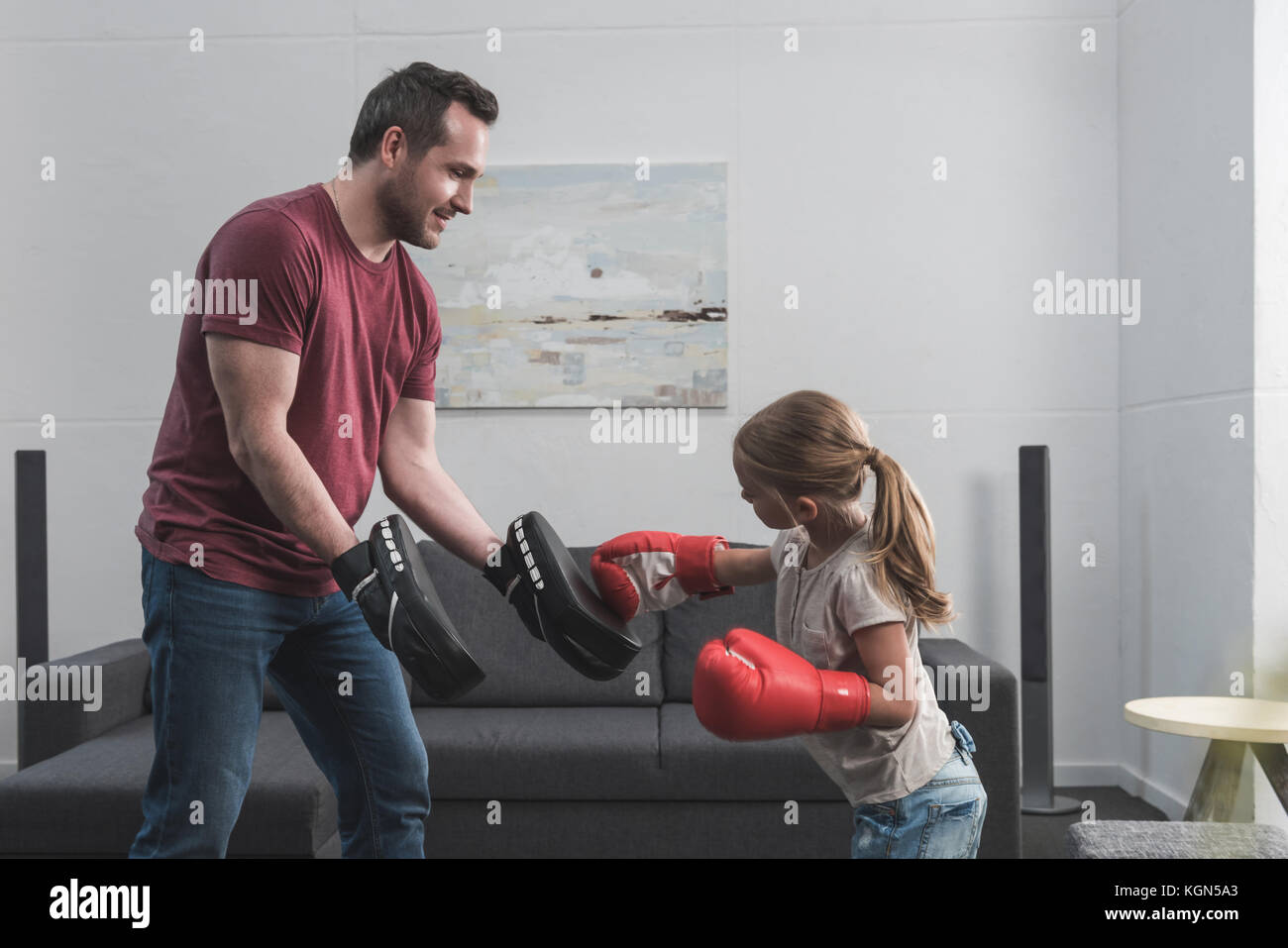 preschooler child learning boxing with father Stock Photo Alamy