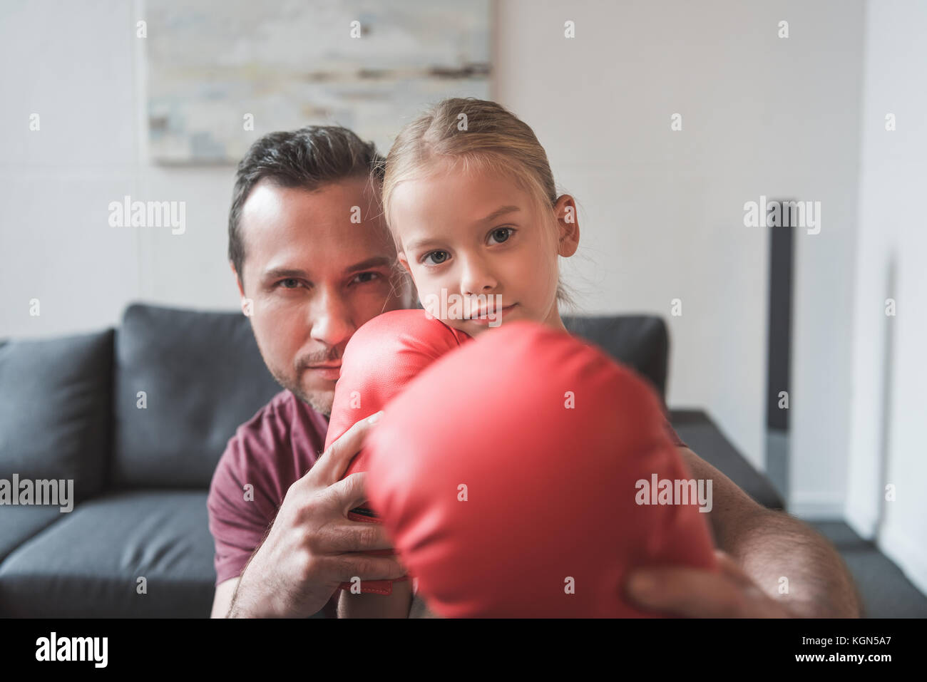 Father showing daughter how to boxing Stock Photo Alamy