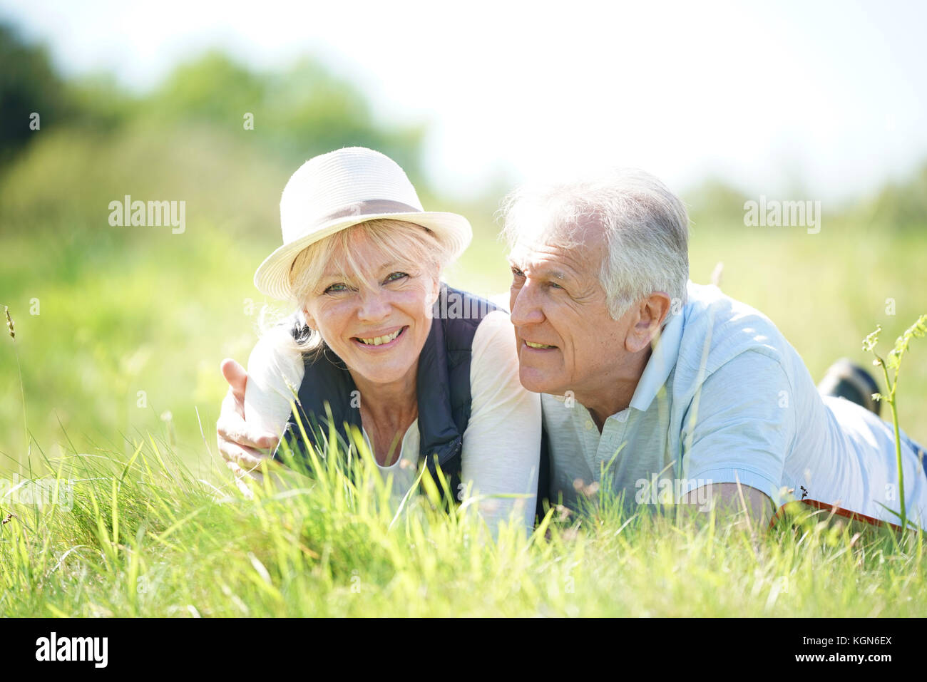 Senior couple relaxing in countryside Stock Photo - Alamy