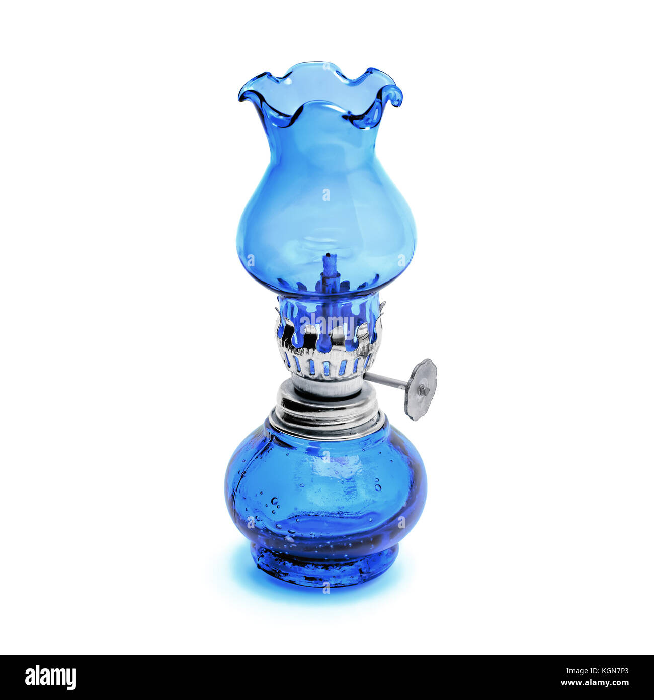 Oil lamp wick lantern made of blue glass and metal isolated on white