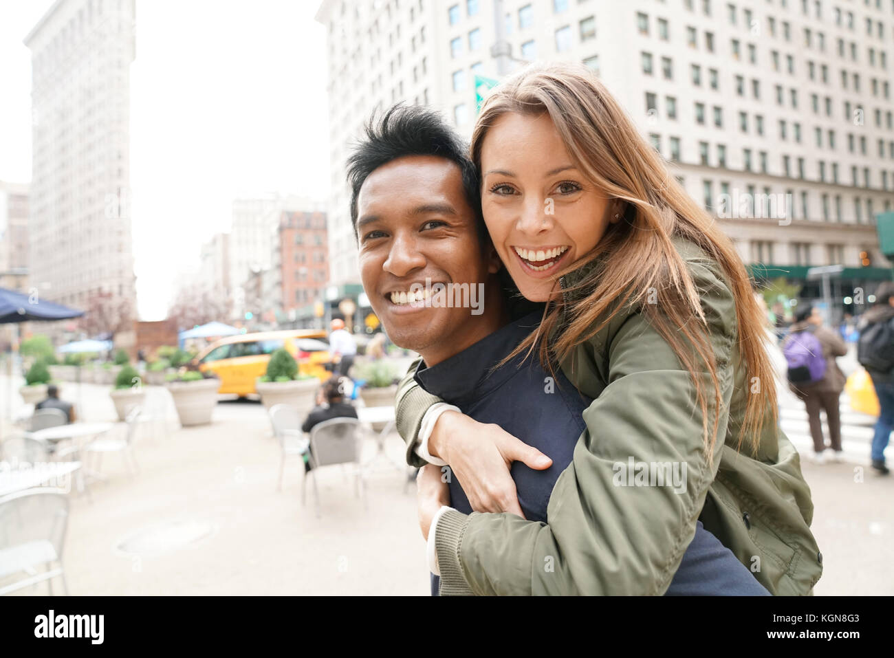 Cheerful couple in New York City street Stock Photo Alamy