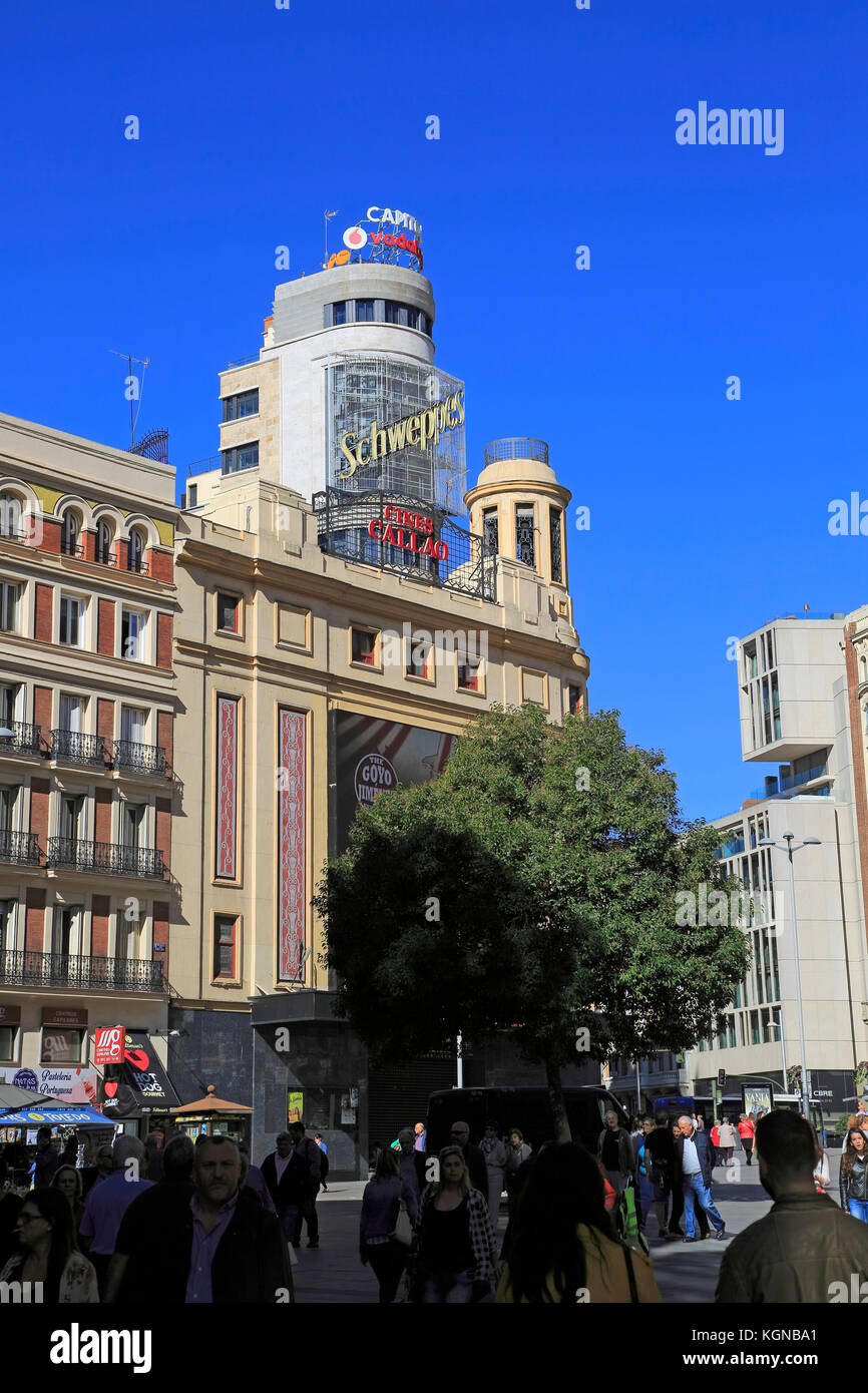 Buildings neon advert signs on Callao plaza square in Madrid city