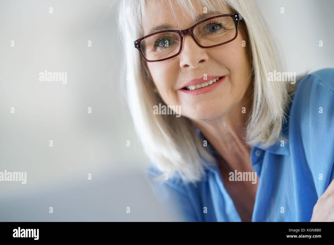 Portrait of senior businesswoman wearing eyeglasses Stock Photo