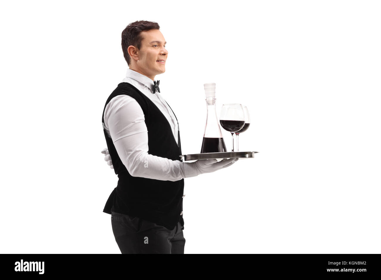 Waiter holding a tray with wine and two glasses isolated on white background Stock Photo
