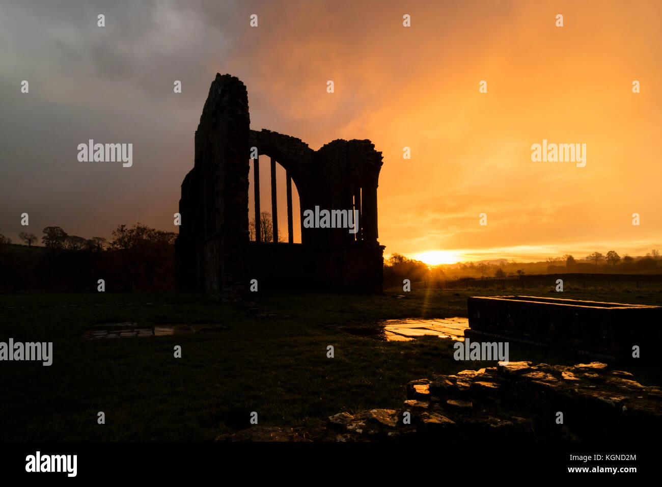 Egglestone Abbey, Barnard Castle, Teesdale, County Durham UK.  Thursday 9th November 2017. UK Weather.  Heavy showers to start the day as the first rays of the rising sun began to illuminate the ruins of Egglestone Abbey near Barnard Castle this morning.  Credit: David Forster/Alamy Live News Stock Photo