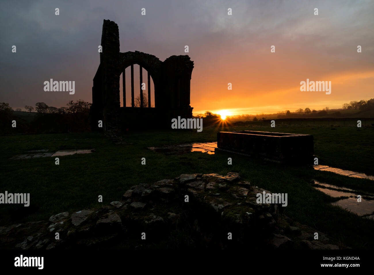 Egglestone Abbey, Barnard Castle, Teesdale, County Durham UK.  Thursday 9th November 2017. UK Weather.  Heavy showers to start the day as the first rays of the rising sun began to illuminate the ruins of Egglestone Abbey near Barnard Castle this morning.  Credit: David Forster/Alamy Live News Stock Photo
