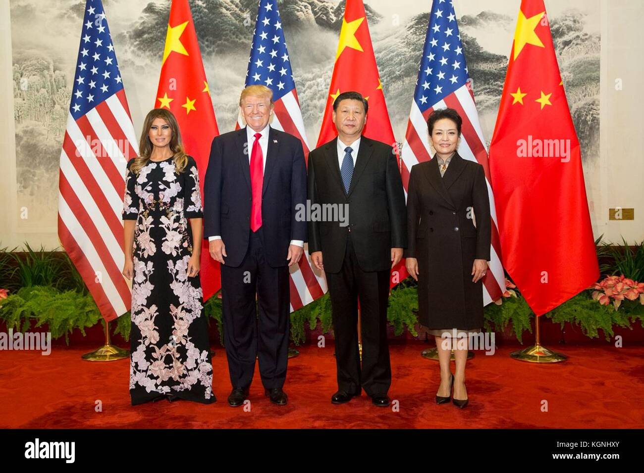 Beijing, China. 09th Nov, 2017. U.S President Donald Trump, first lady  Melania Trump, Chinese President Xi Jinping, and his wife Peng Liyuan,  stand for a photo during the formal arrival ceremony at