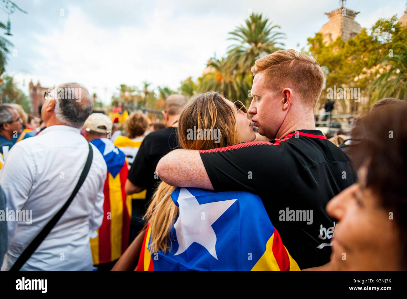 Barcelona, 10 october 2017 - people march in the street of barcelona asking for catalunya's independence holding catalan flags Stock Photo