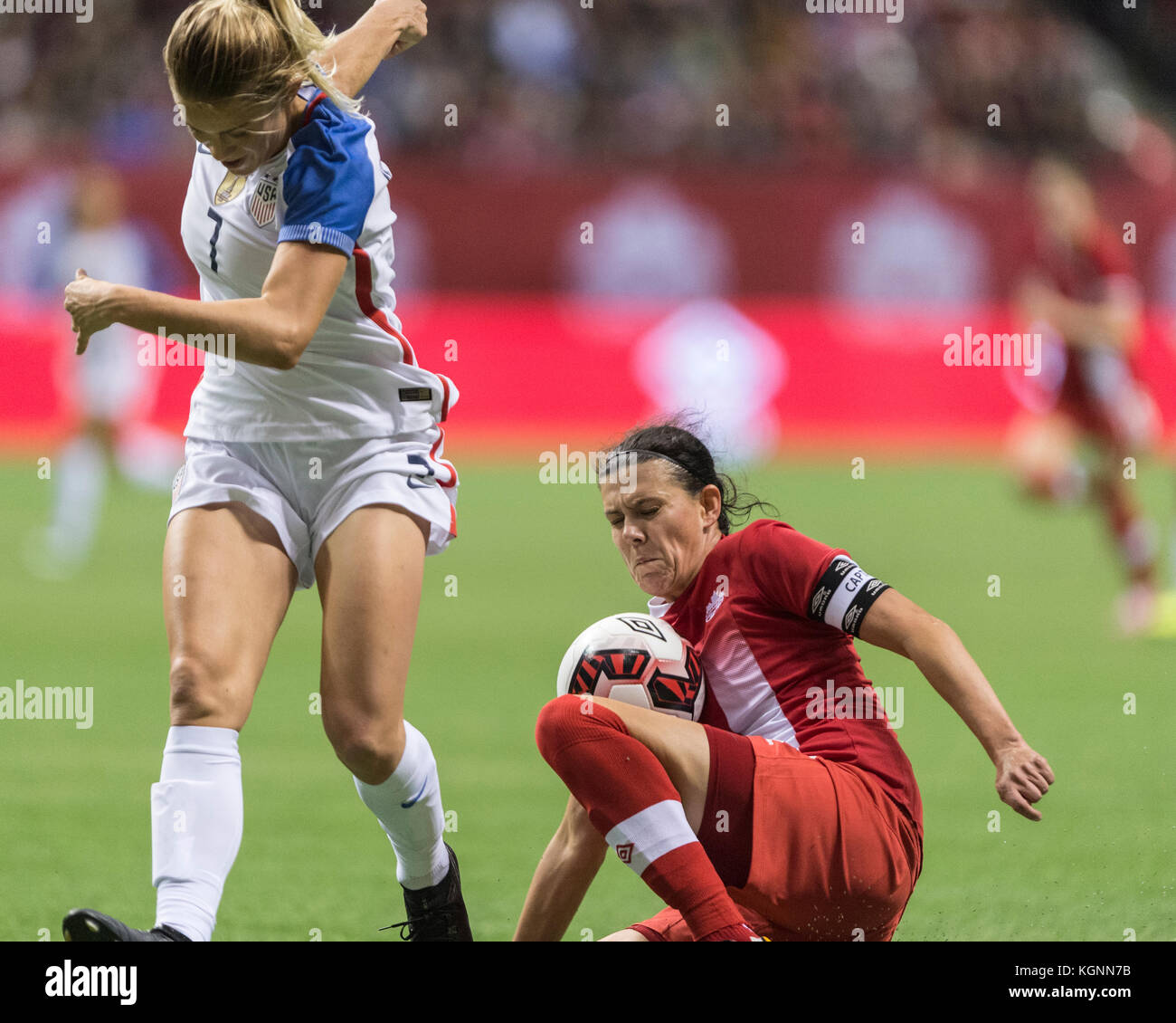 Vancouver, Canada. 9th Nov, 2017. Christine Sinclair of Canada playing the ball from the ground, with Abby Dahlkemper of USA (L). Final score 1-1. Canada vs USA, BC Place Stadium. Credit: Gerry Rousseau/Alamy Live News Stock Photo