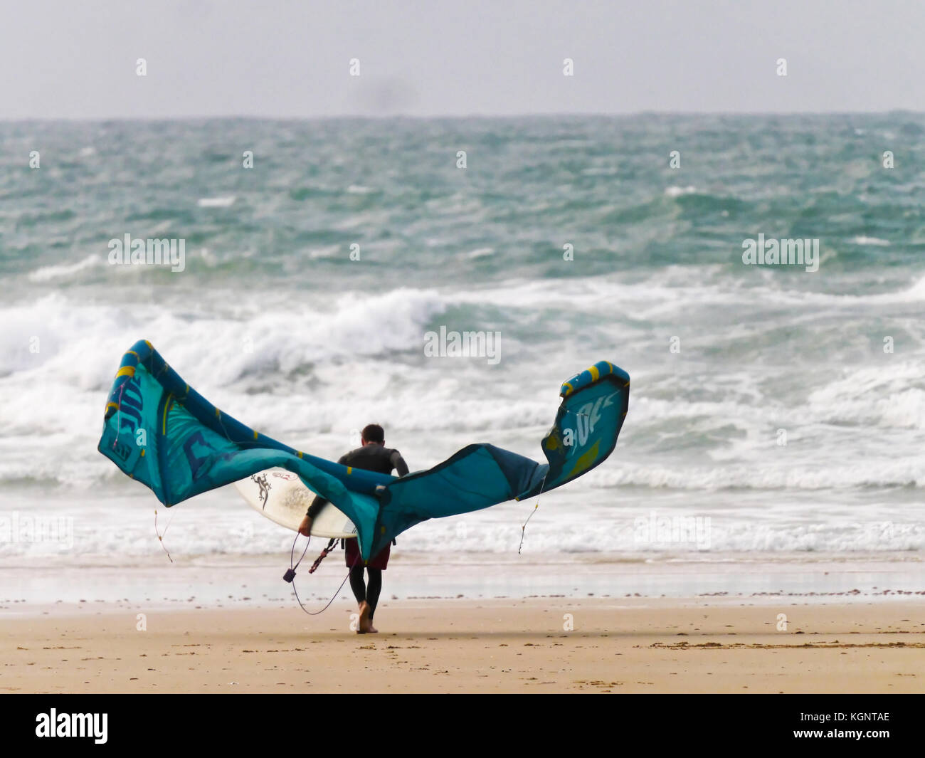 Kite surfer battles against the wind Stock Photo Alamy