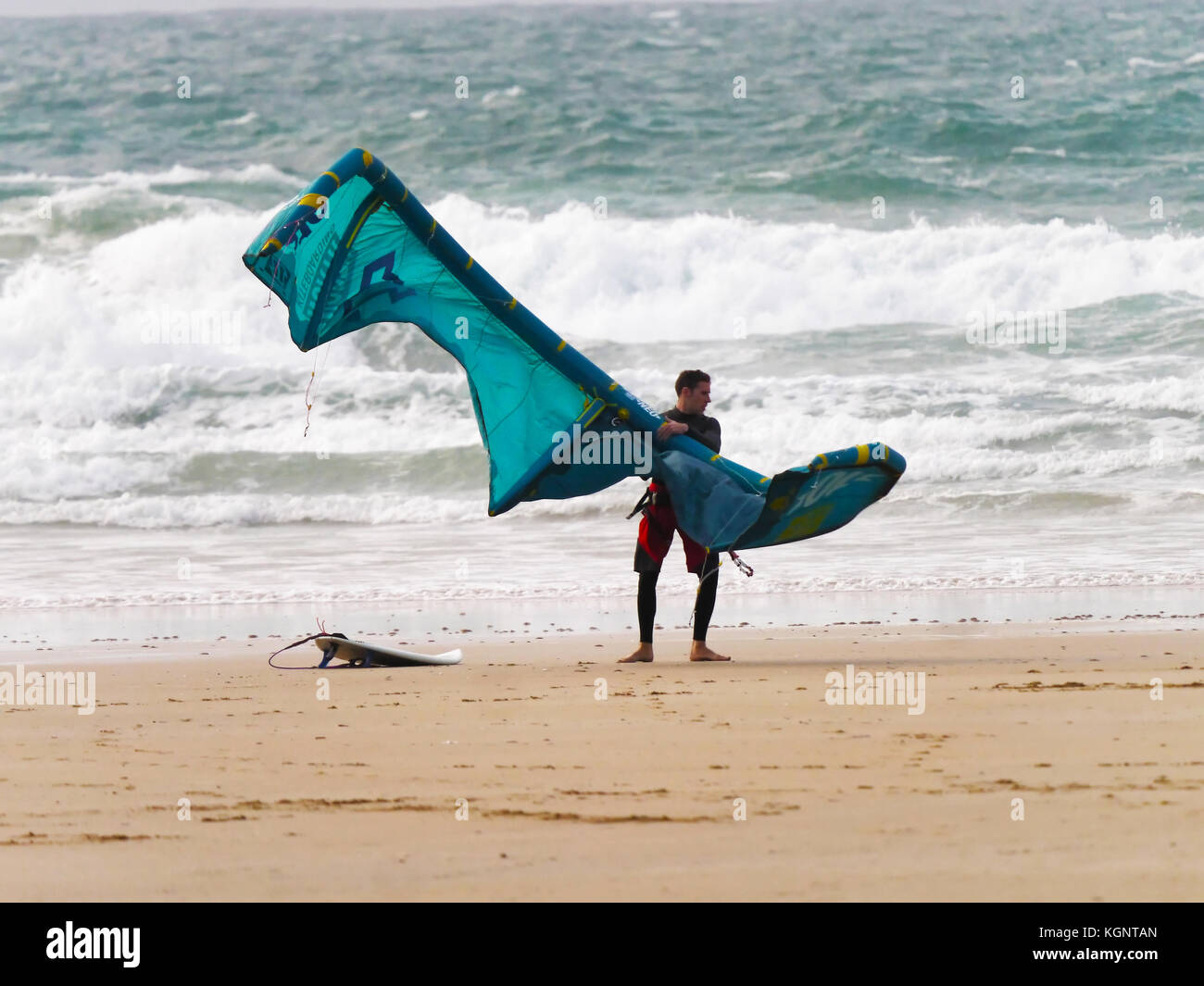 Kite surfer battles against the wind Stock Photo Alamy