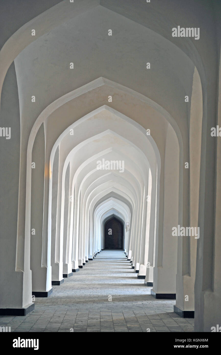 Bukhara: White corridor of Madrassah Stock Photo - Alamy
