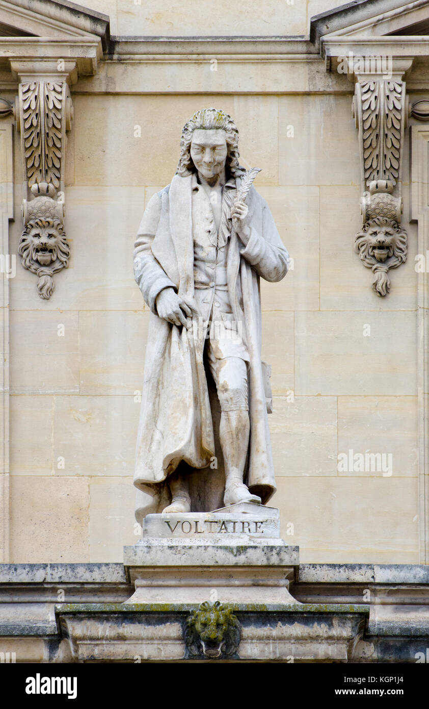 Paris, France. Palais du Louvre. Statue in the Cour Napoleon: Voltaire (François-Marie Arouet: 1694 – 1778) Enlightnement writer, historian and philos Stock Photo