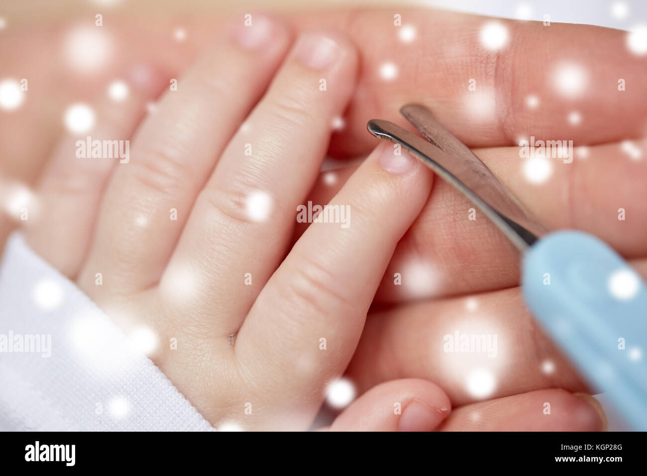 close up of hand with scissors trimming baby nails Stock Photo Alamy