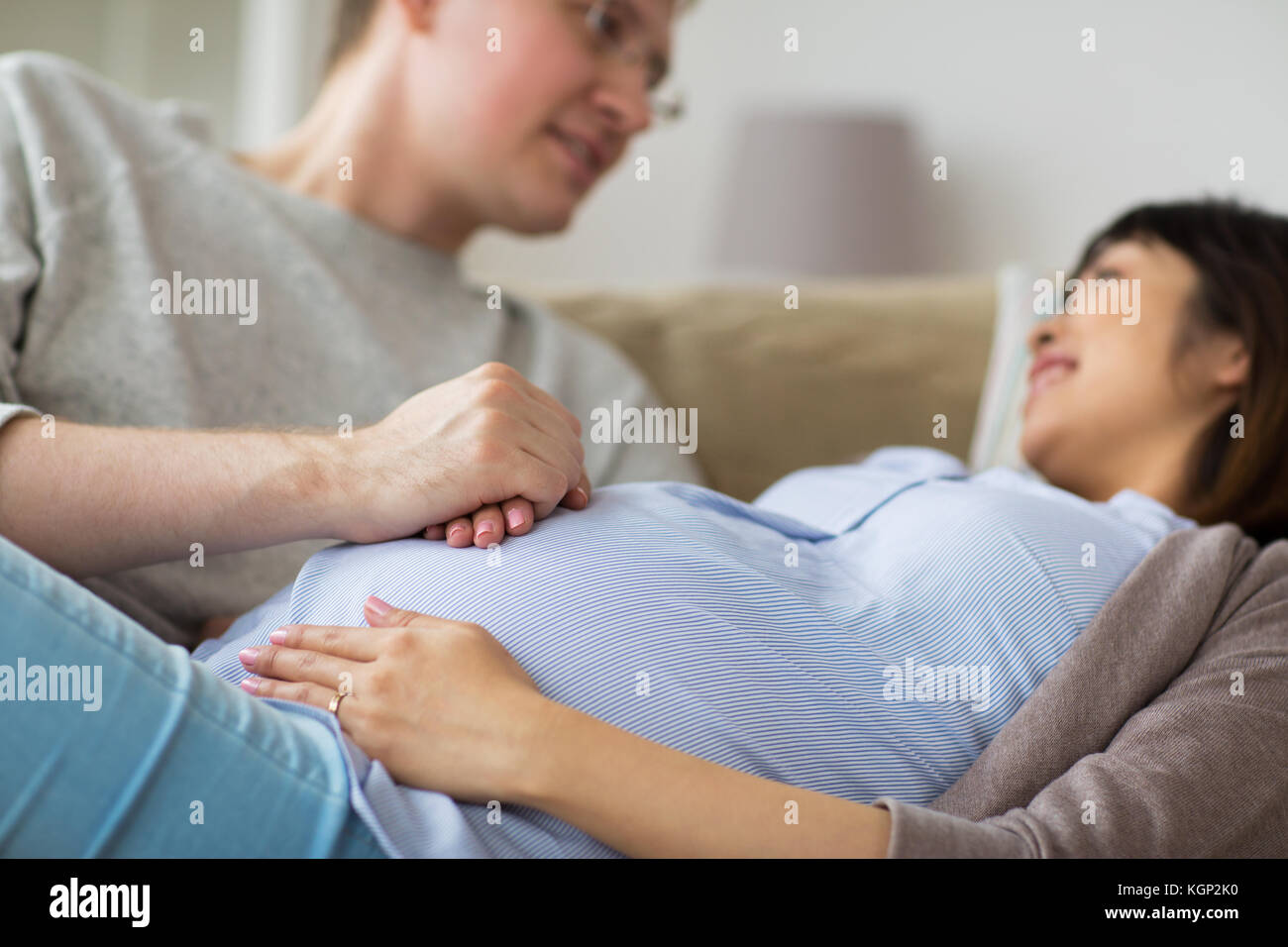 close up of man and pregnant woman Stock Photo - Alamy