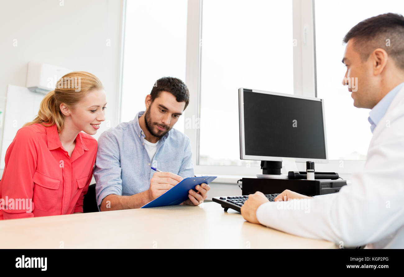 couple visiting doctor at family planning clinic Stock Photo Alamy
