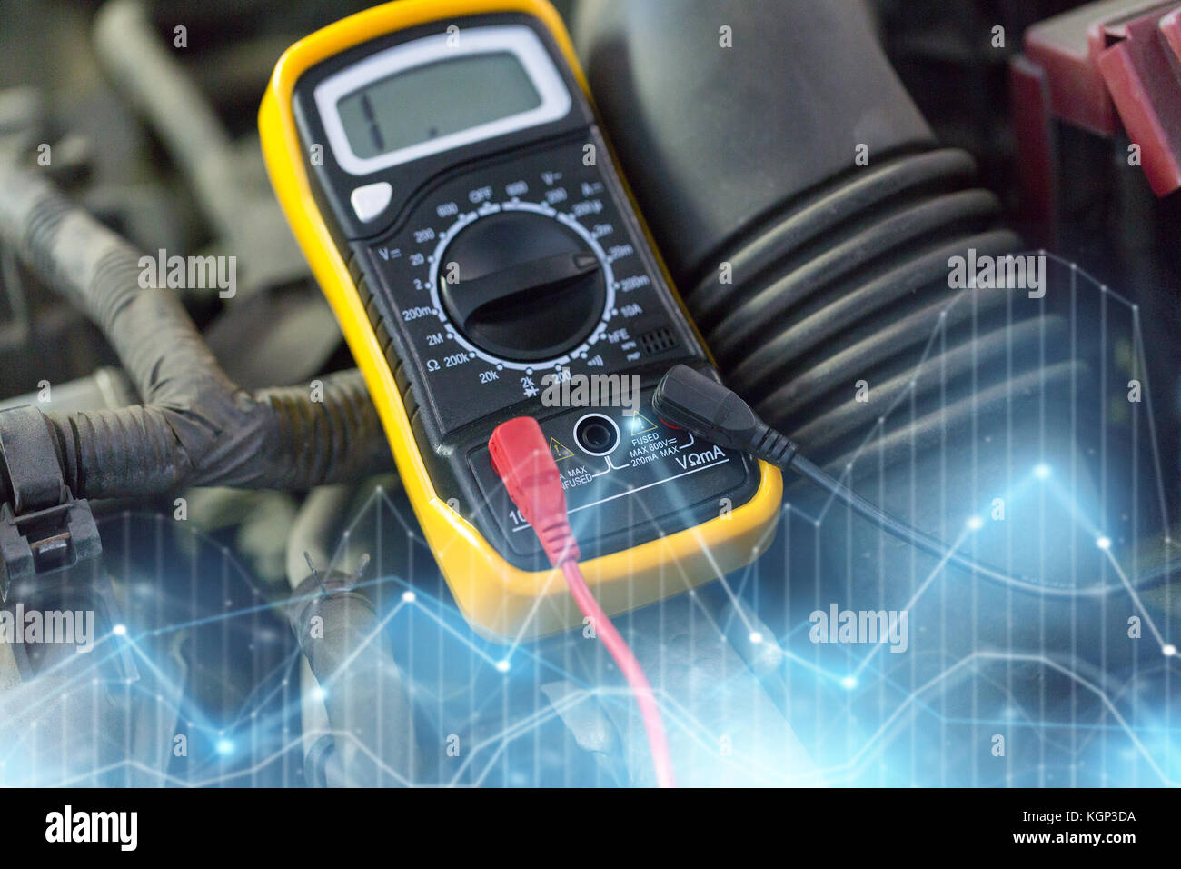 multimeter or voltmeter testing car battery Stock Photo
