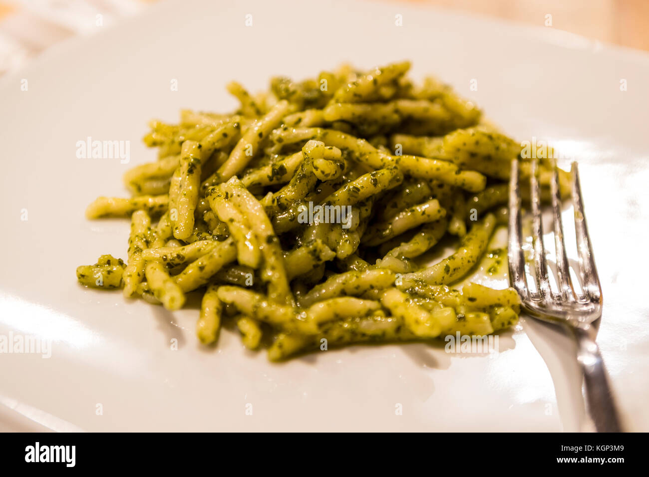 Strozzapreti. Pasta and pesto lunch, Bologna city life, Italy Stock