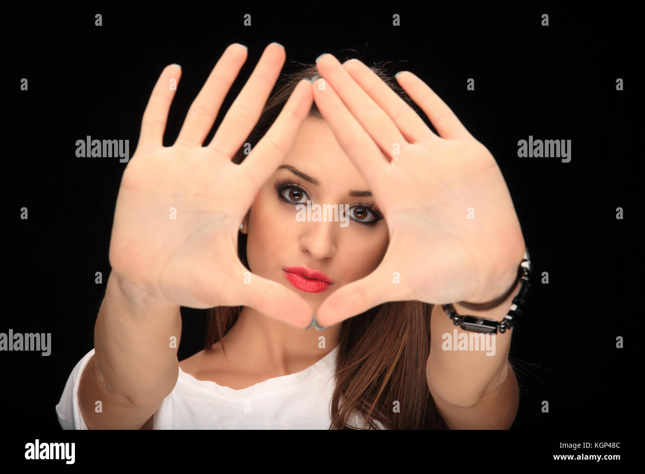 portrait of a beautiful young girl on a black background Stock Photo ...
