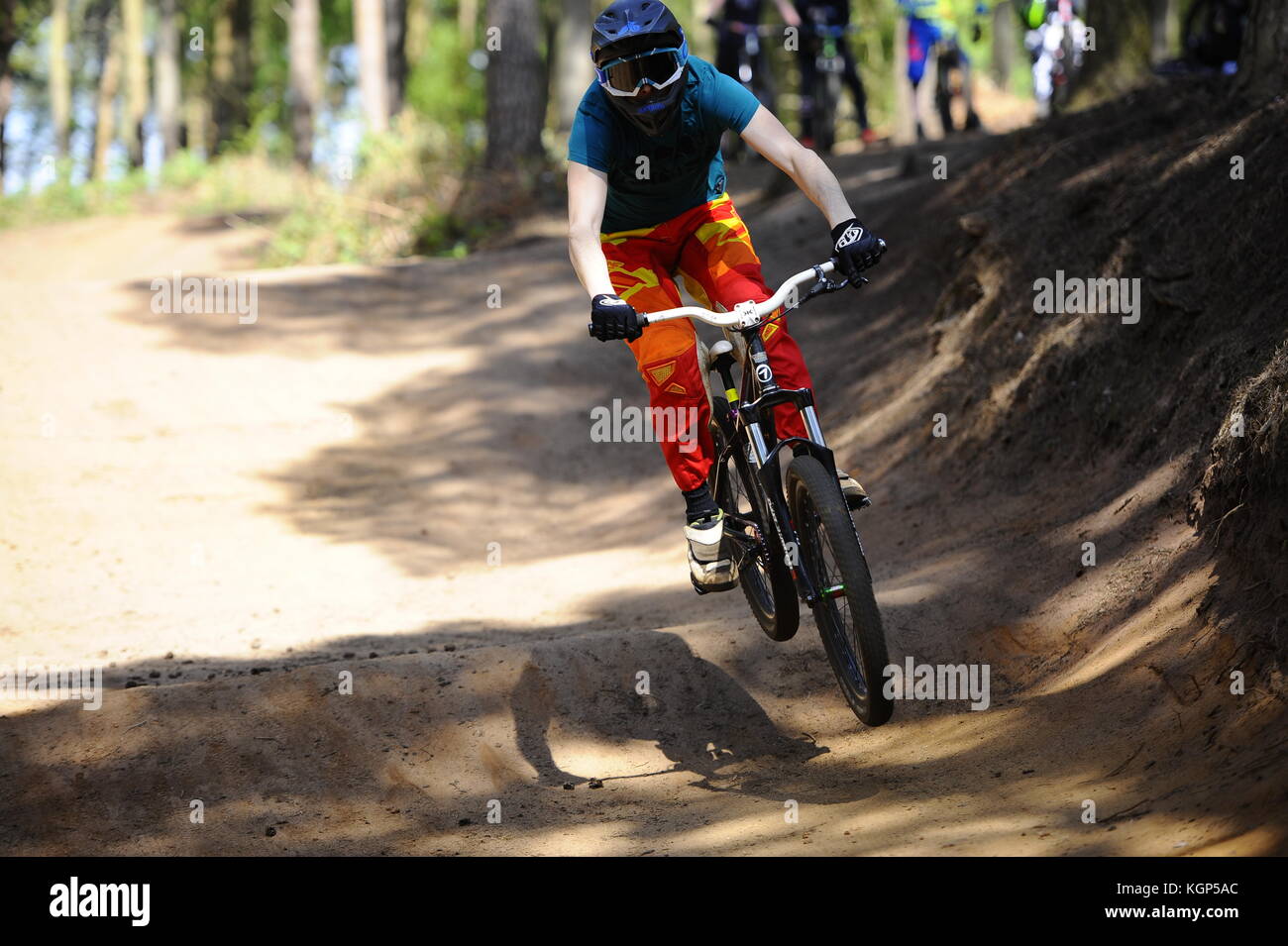 Motorcycle riding down mountain road hi-res stock photography and ...