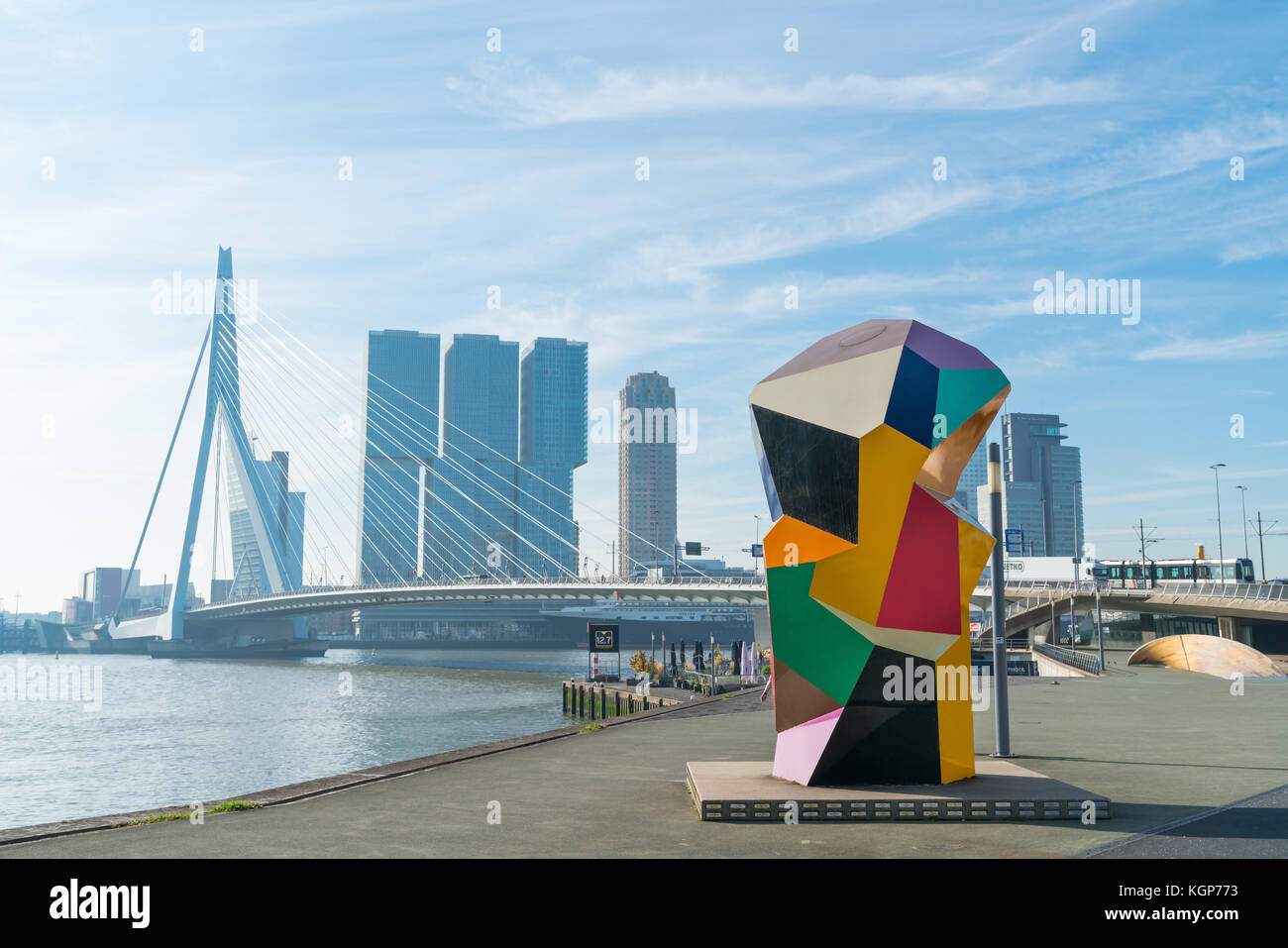 ROTTERDAM, HOLLAND -AUGUST 22, 2017; Multi-colored cubic sculpture Marathon Image in Erasmuburg district with city's stunning modern architectural bui Stock Photo