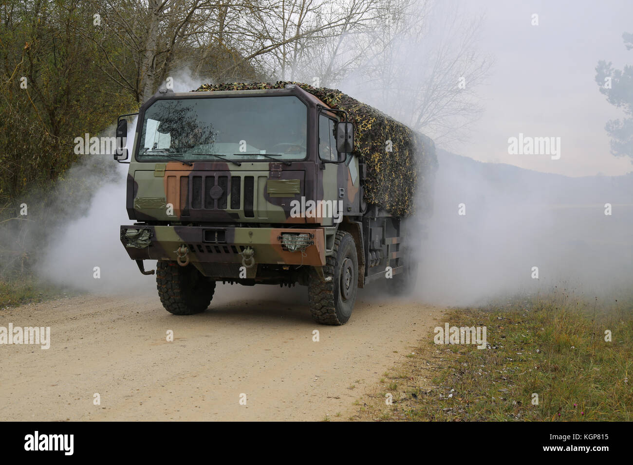 An Italian soldier operates a light medium tactical vehicle while conducting squad drills during exercise Allied Spirit VII at the U.S. Army’s Joint M Stock Photo