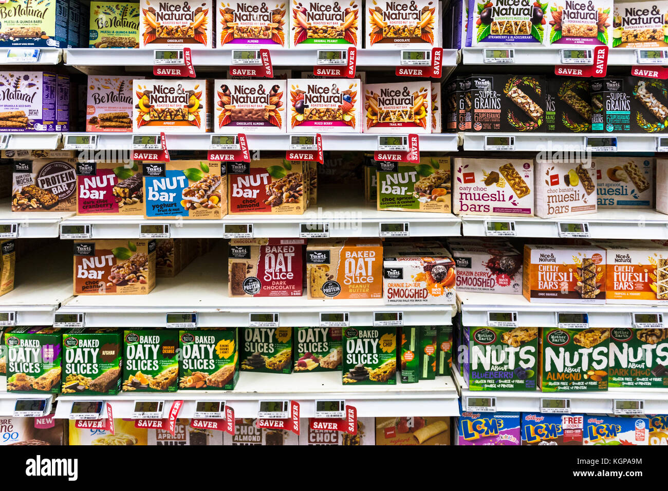 WELLINGTON, NEW ZEALAND - MARCH 1, 2017: Various cereal and nuts bars are displayed in a supermarket in Wellingtion in New Zealand capital city. Stock Photo
