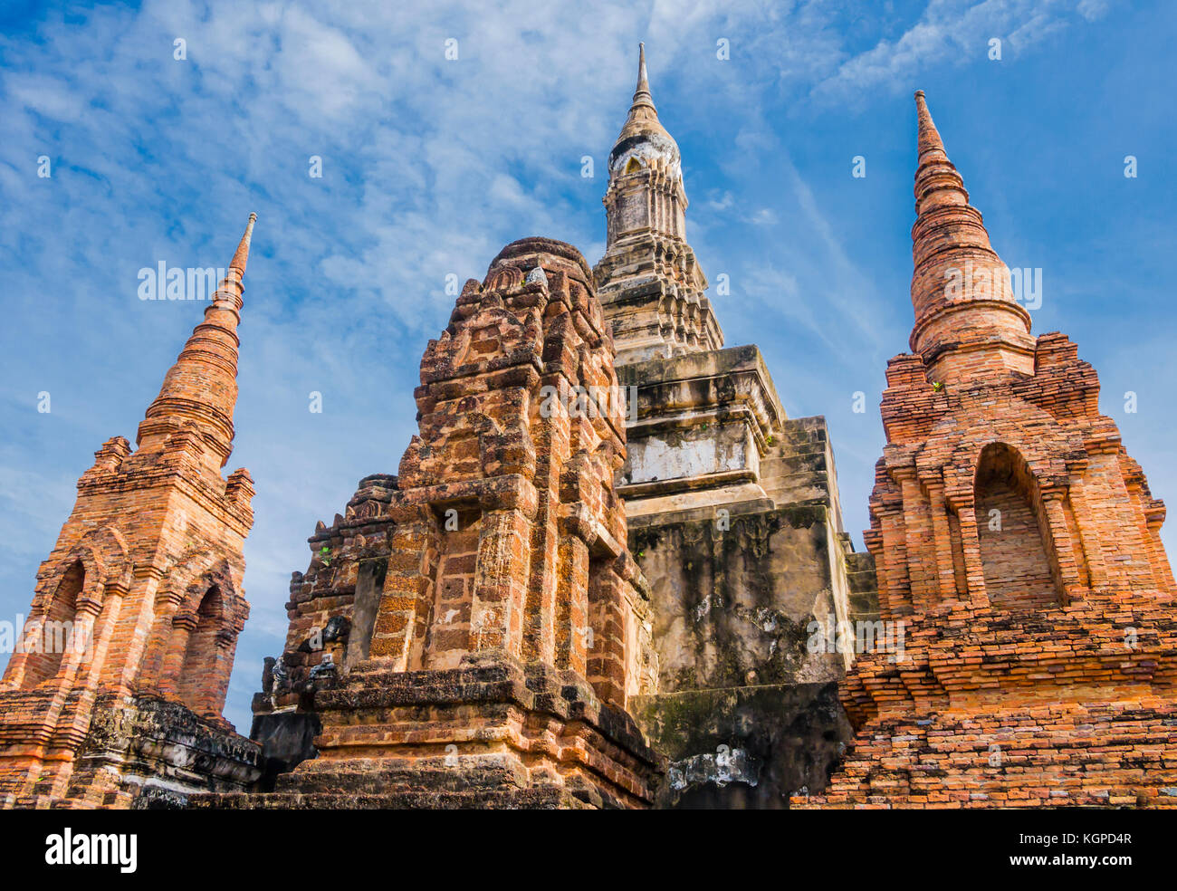 Perspective view of Stupa and Pagoda in Wat Mahathat Temple, Sukhothai Historical Park, Thailand Stock Photo
