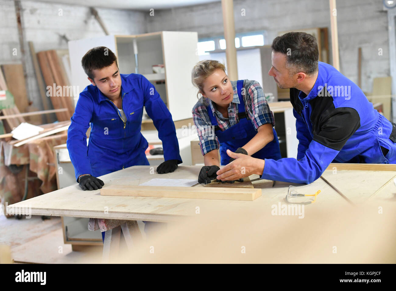 Students in woodwork training course with professional Stock Photo - Alamy