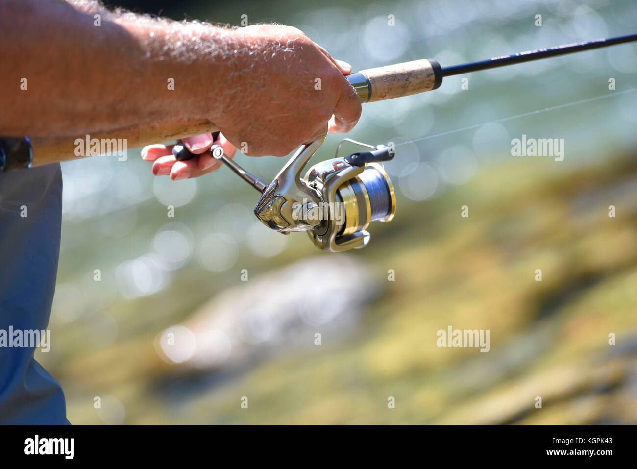 Fishing rod holding hi-res stock photography and images - Page 7 - Alamy