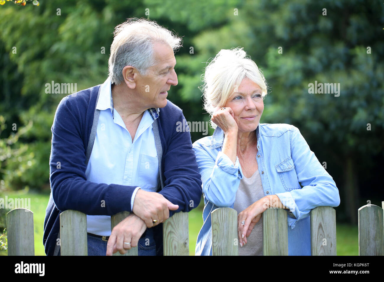 Senior woman garden fence hi-res stock photography and images - Alamy