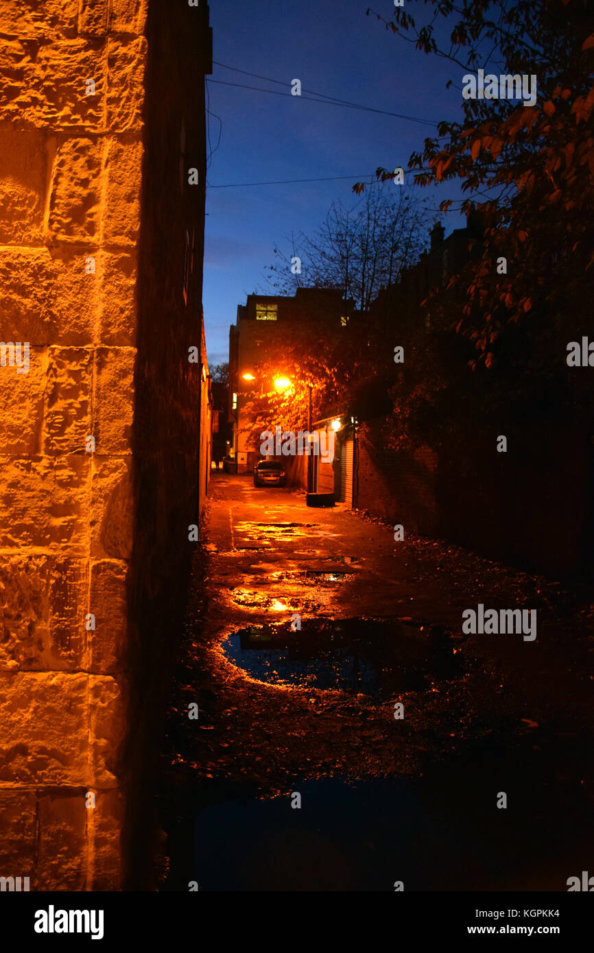 Alleyway at night, West End area of Glasgow, Scotland Stock Photo
