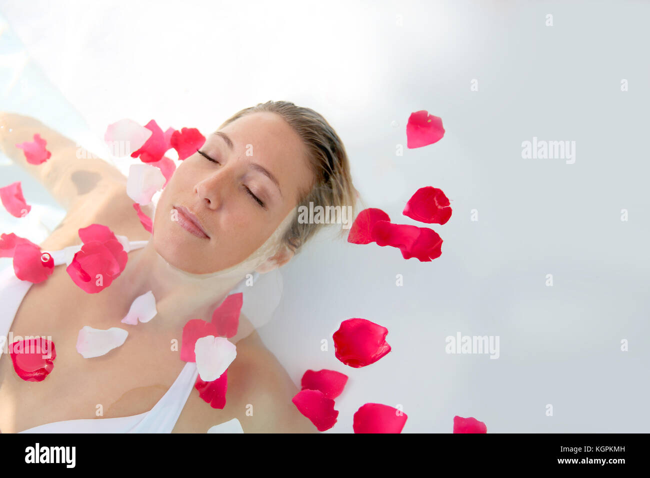 Woman relaxing in spa bathtube Stock Photo