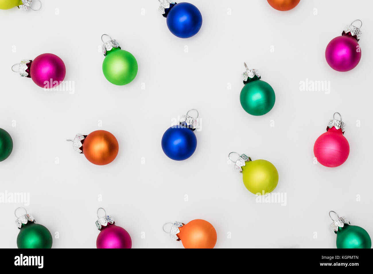 Festive Christmas Baubles On A Plain White Background Stock Photo