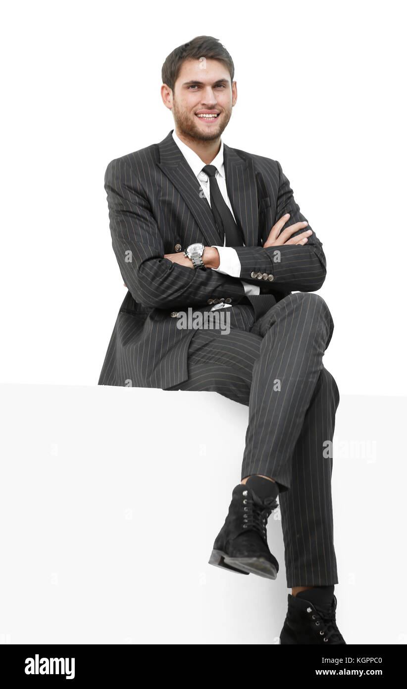 portrait of handsome businessman sitting on a chair Stock Photo