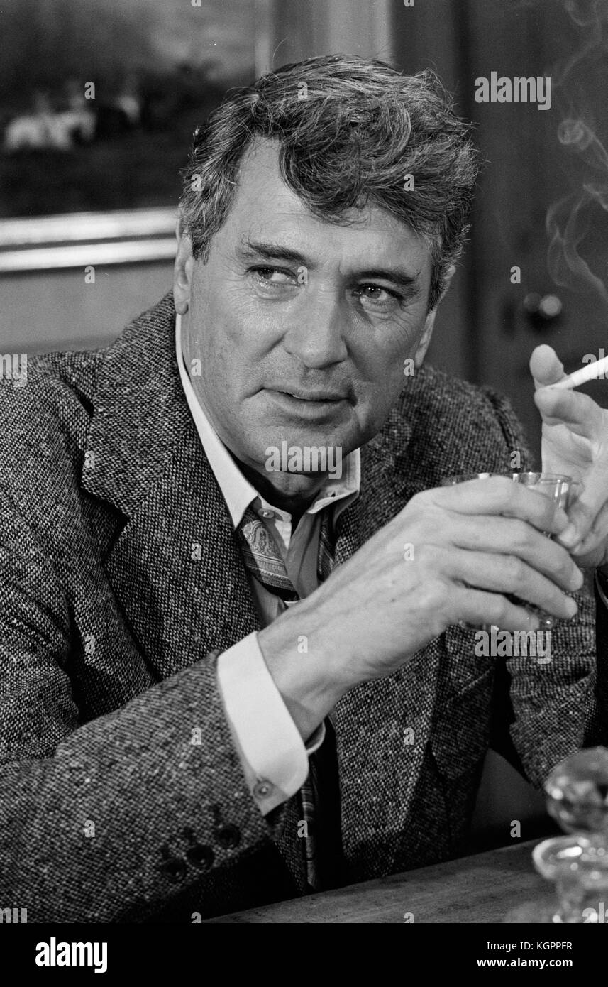 cracked mirrors and cigarette smoke The Mirror Crack'd (1980) , Rock Hudson Date: 1980 Stock Photo