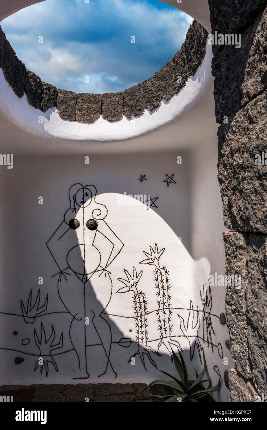 Entrance to the women's toilet, Jardin de Cactus. Cactus Garden designed by  Cesar Manrique, Risco de las Nieves range, Guatiza. Lanzarote Island. Cana  Stock Photo - Alamy