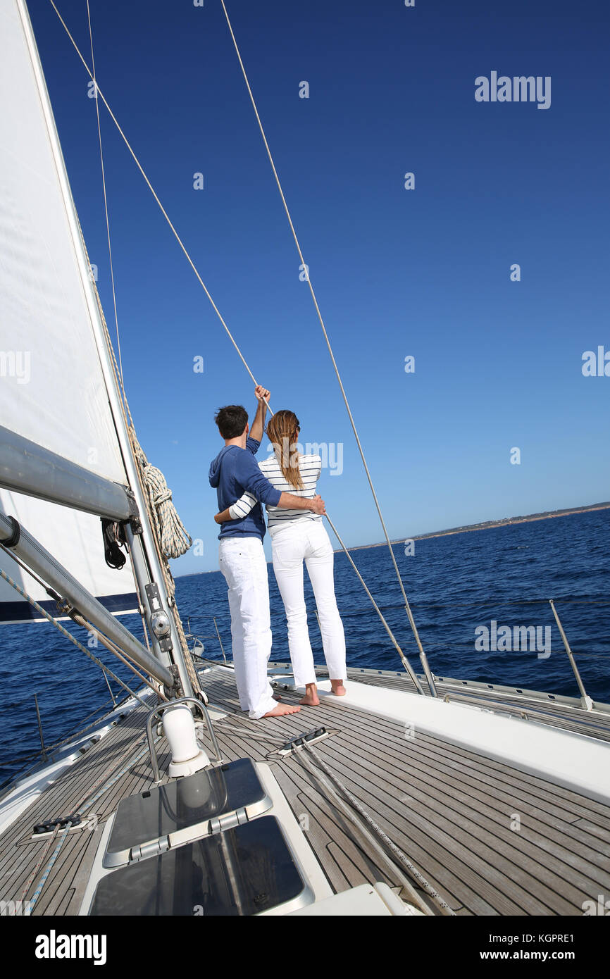 Fancy Couple Enjoying Sailing On A Beautiful Sailboat Stock Photo Alamy Fancy Couple Enjoying Sailing On A Beautiful Sailboat Stock Photo Alamy