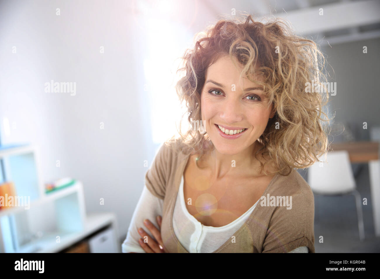 Beautiful woman curly blond hi-res stock photography and images - Alamy