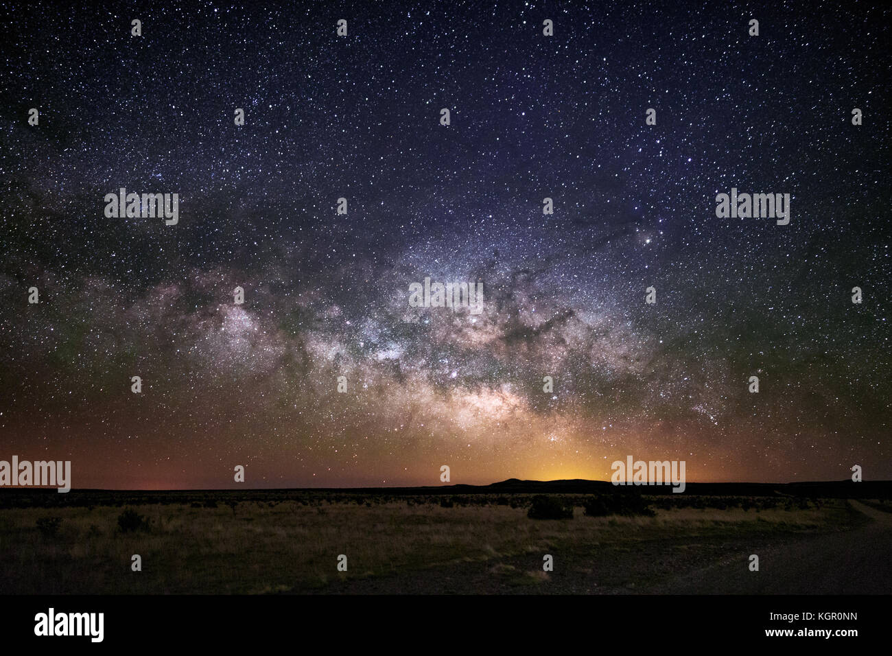 The Milky Way rising with stars in the night sky near Roswell, New Mexico Stock Photo