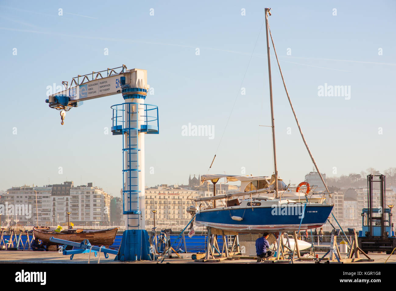 Boat Repair at Harbor Stock Photo - Alamy