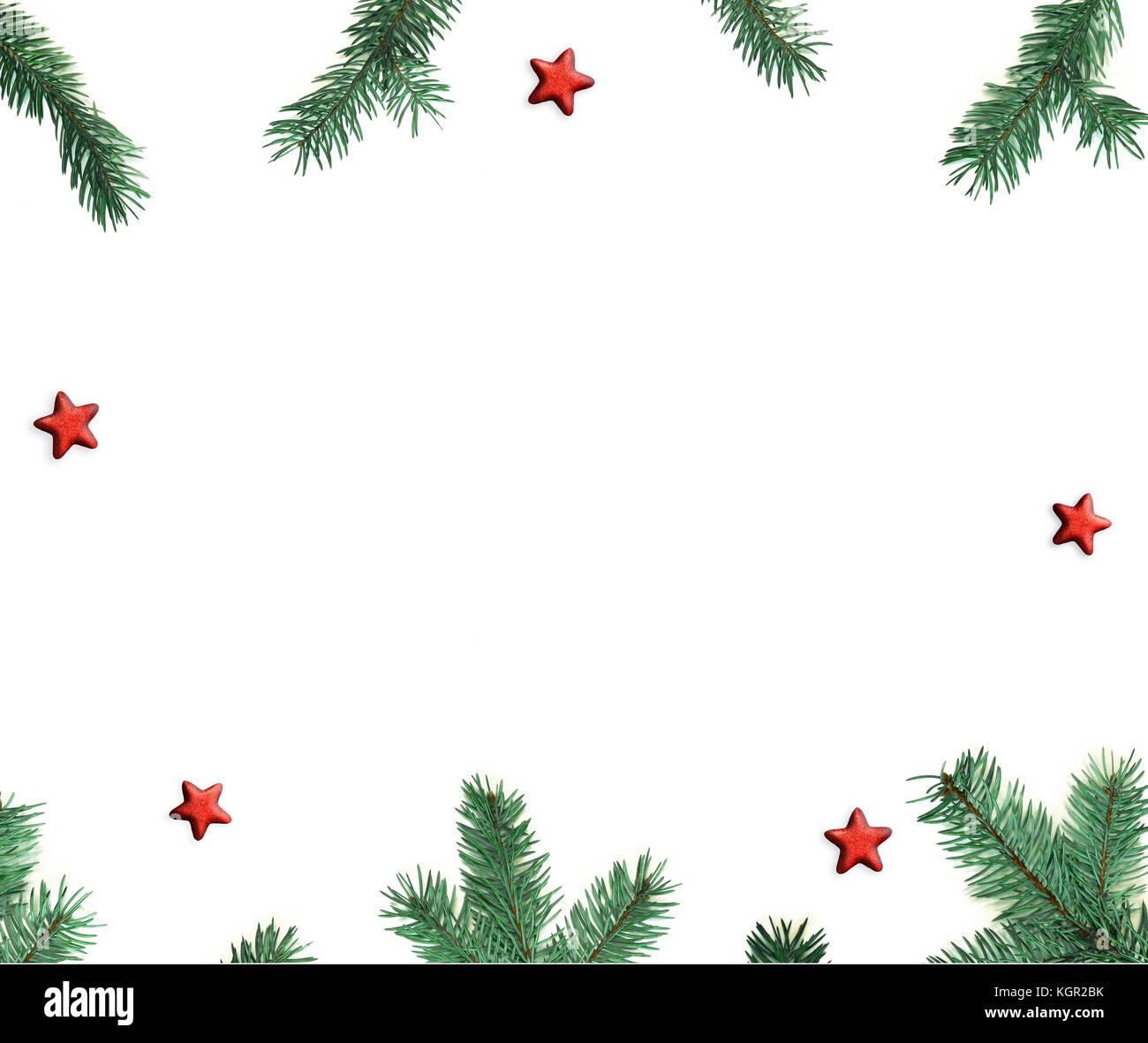 Fir tree branch and star on white background. Top view with copy space ...