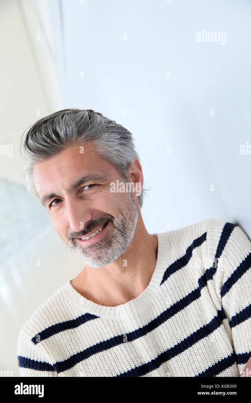Portrait of handsome mature man on white background Stock Photo - Alamy