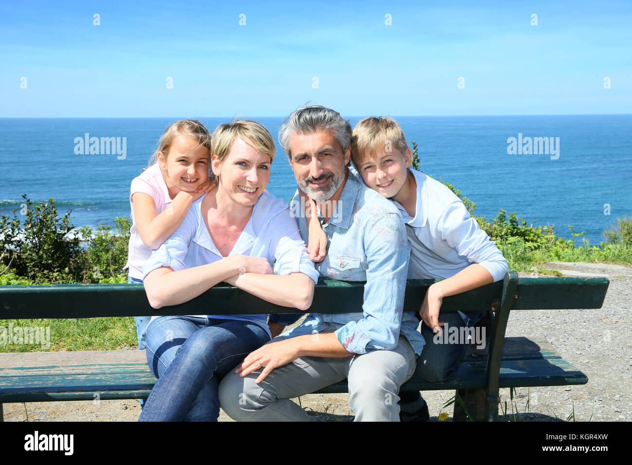 Bench for four people hi-res stock photography and images - Alamy
