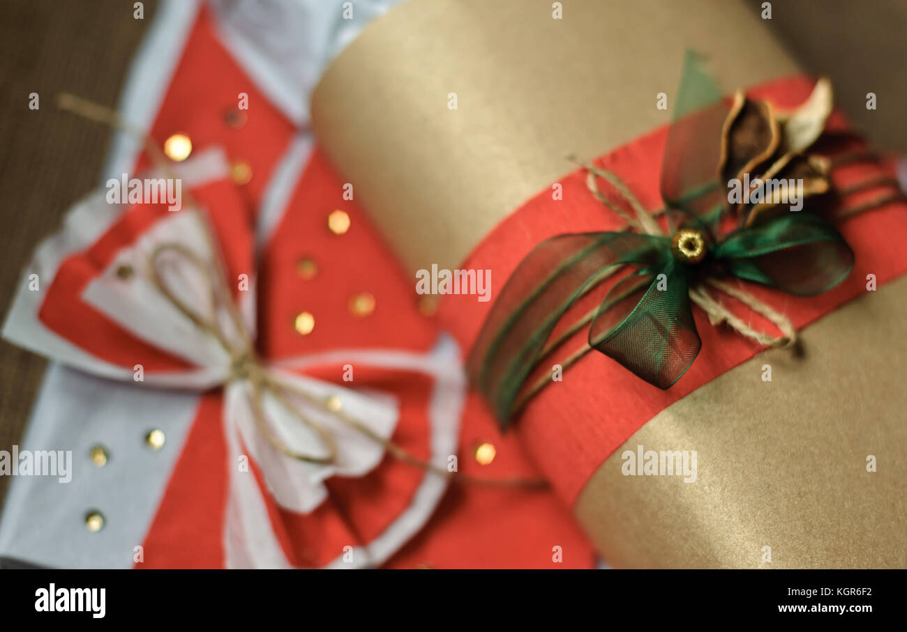 Gifts decorated with red ribbon, rope, ribbon and sequins Stock Photo ...